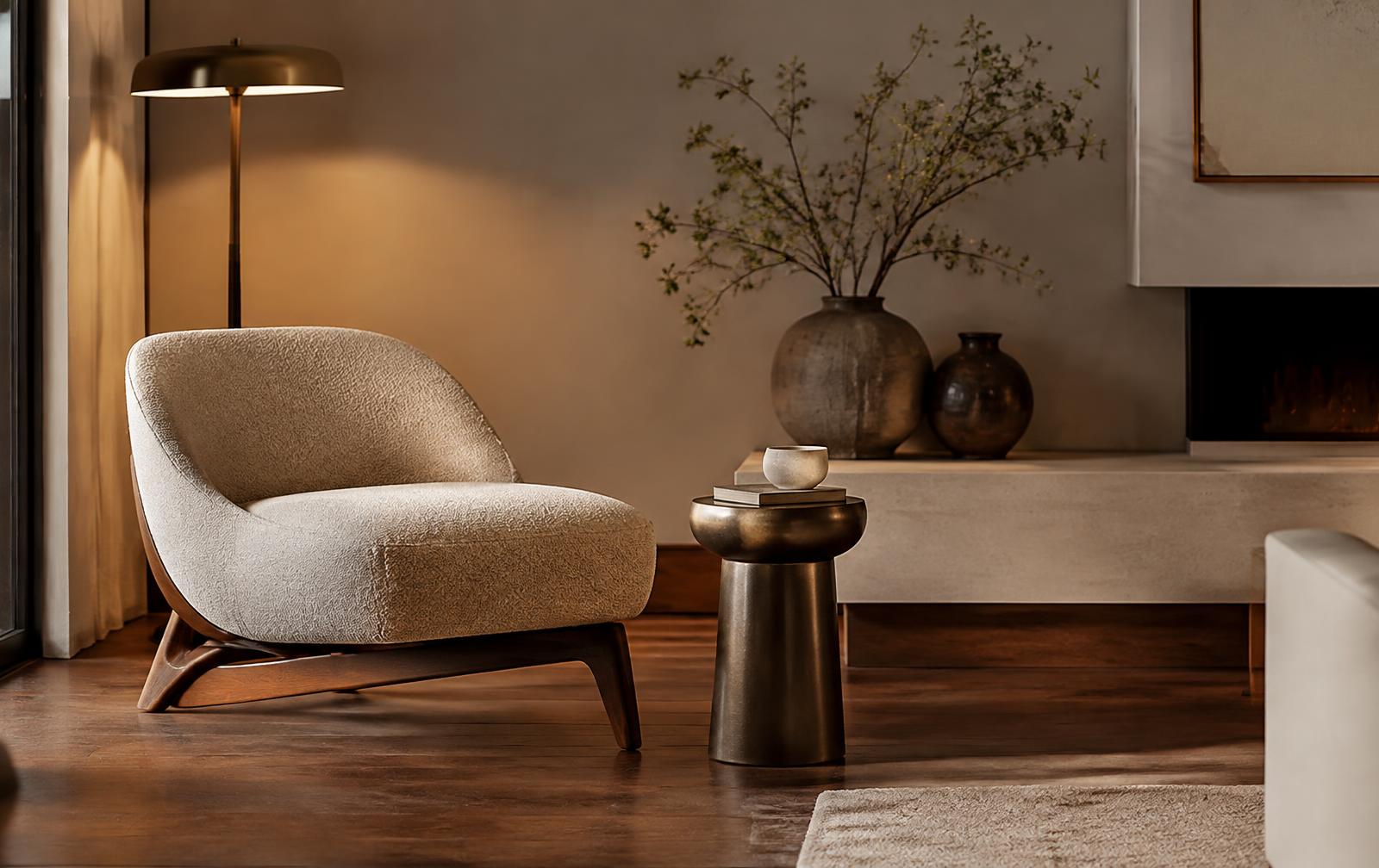 Living room corner with a boucle lounge chair on a curved walnut base, a bronze side table, ceramic vases and a brass floor lamp at 3599K